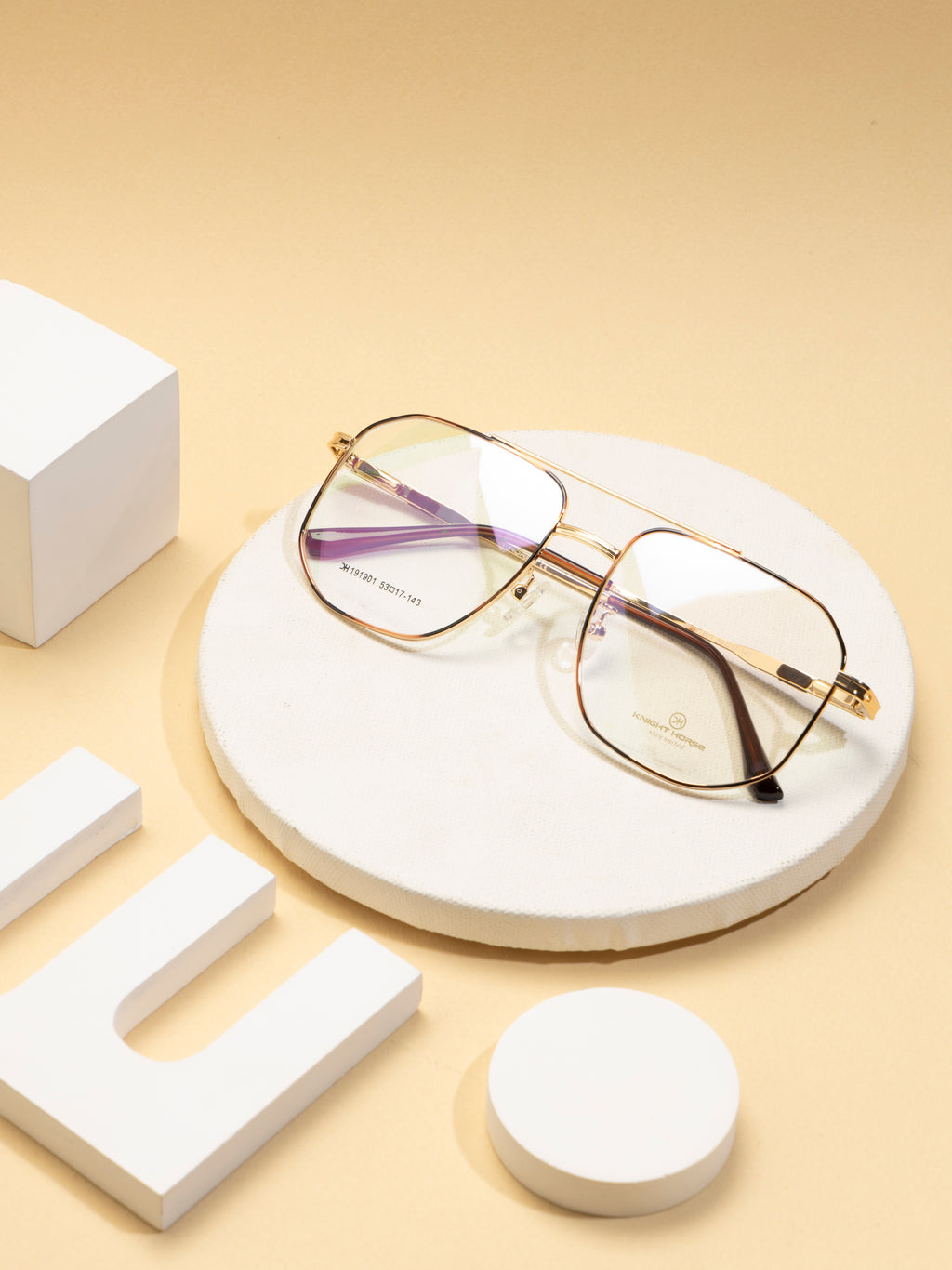 Hexagon-Shaped Gold Metal Eyewear Frame With A Double Bar Design