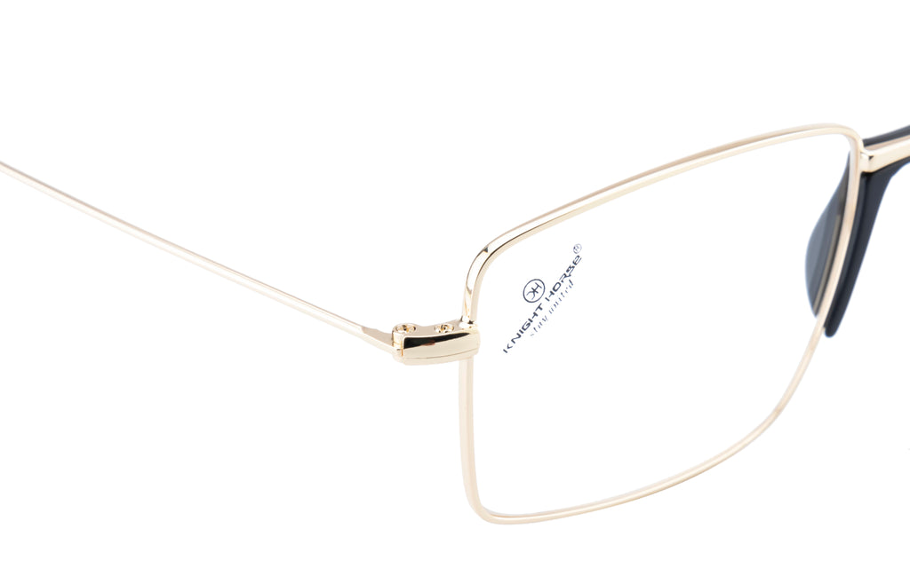 Metal Eyewear Frame Featuring A Luxurious Golden Finish In A Sleek Rectangular Shape